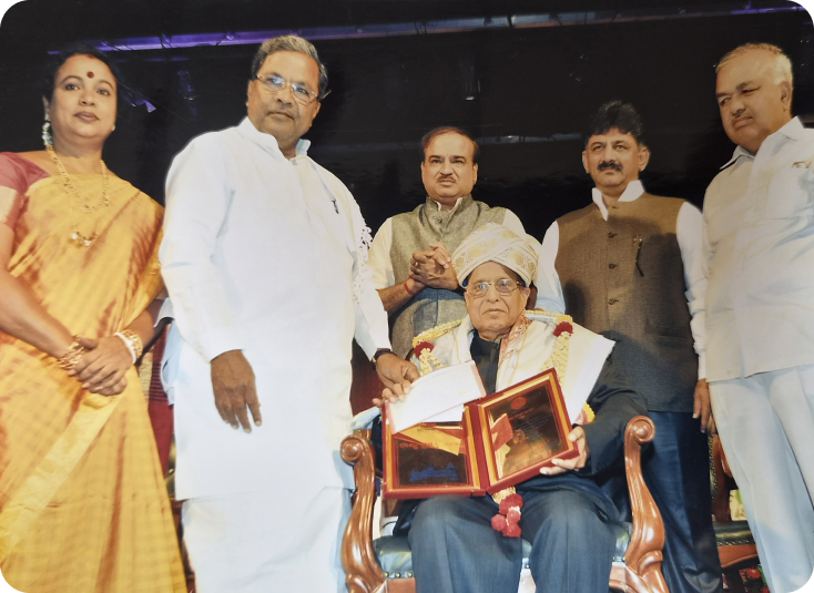 Receiving the Rajyotsava Prashasti, 2014